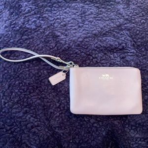 Pink Coach zip wristlet.